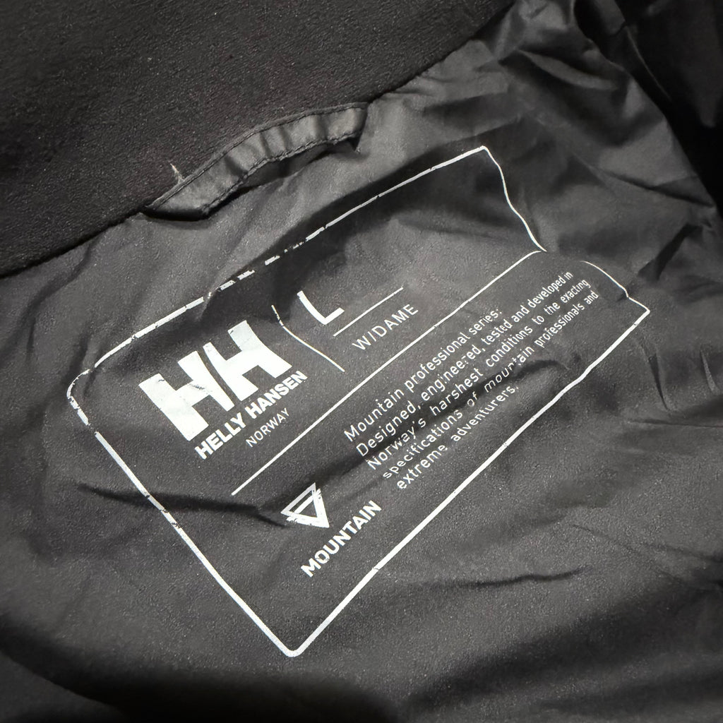 Helly Hansen Norway Women's 600+ Fill Power Goose Down Stand Collar Puffer Jacket (Lightweight Water Repellent/Windproof Winter/Snow Padded Jacket) in Black