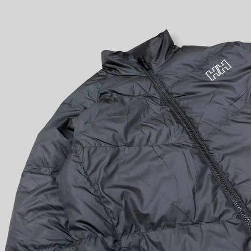 Helly Hansen Norway Women's 600+ Fill Power Goose Down Stand Collar Puffer Jacket (Lightweight Water Repellent/Windproof Winter/Snow Padded Jacket) in Black