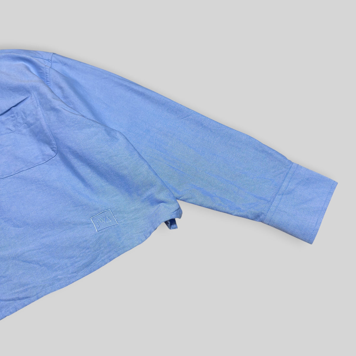 UNIQLO x JW Anderson Unisex Oxford Boxy/Cropped Short Long Sleeve Shirt in Blue