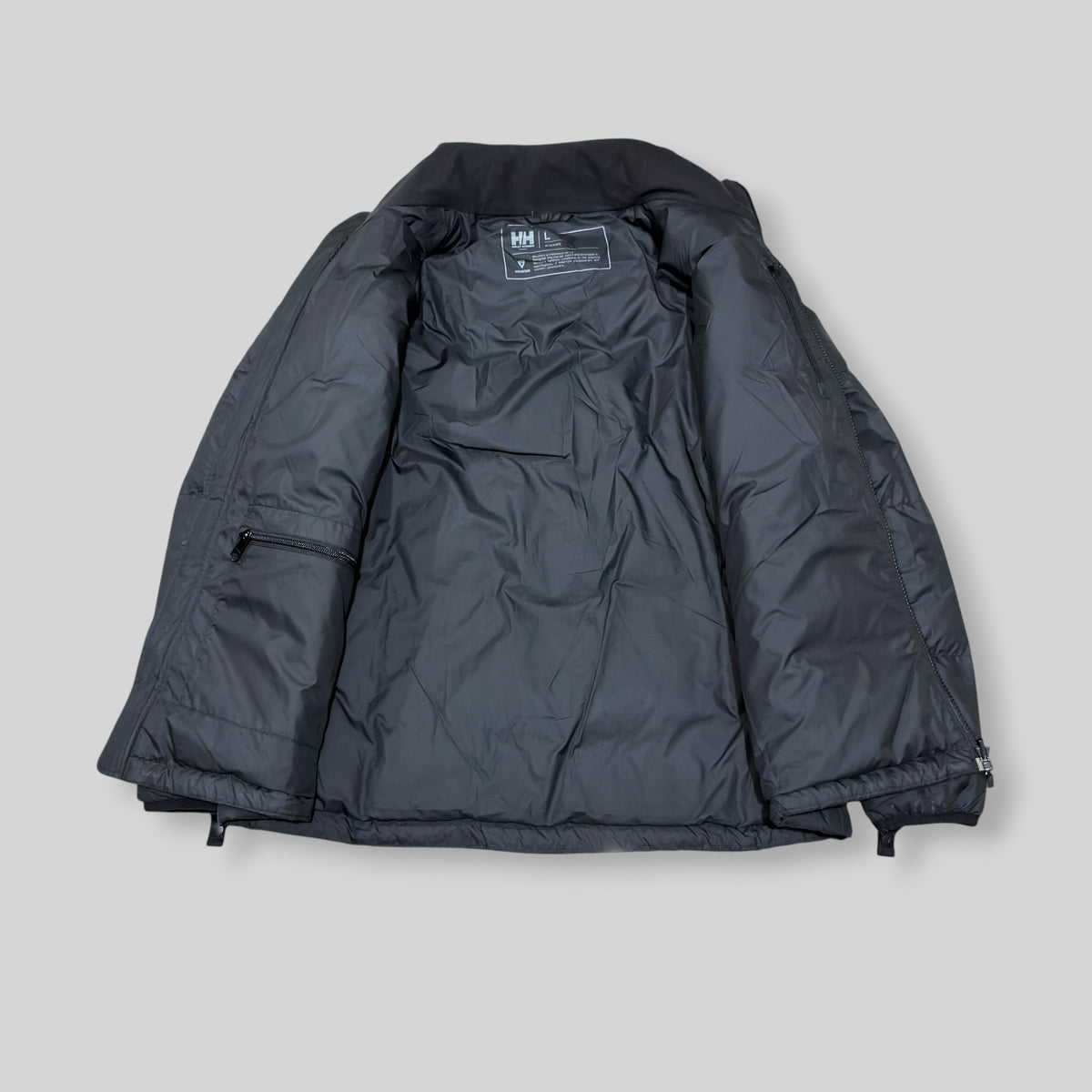 Helly Hansen Norway Women's 600+ Fill Power Goose Down Stand Collar Puffer Jacket (Lightweight Water Repellent/Windproof Winter/Snow Padded Jacket) in Black